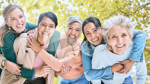 Image of Friends, nature and portrait of group of women enjoying bonding, quality time and relax in retirement together. Diversity, friendship and faces of happy females with smile, hug and embrace in park