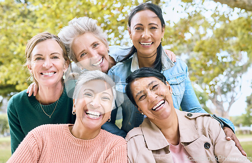 Image of Smile, park and portrait of group of women enjoying bonding, quality time and relax in nature together. Diversity, friendship and faces of happy senior females with calm, wellness and peace outdoors