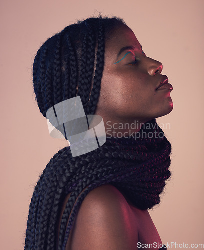 Image of Black woman profile, face and hair with eyes closed, makeup and beauty isolated on studio background. Natural cosmetics, braids and hairstyle with cosmetic care, wellness and African model is content