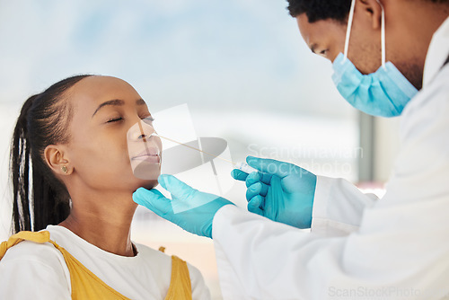 Image of Doctor, patient or covid nose test in hospital checkup, clinic wellness or bacteria virus control. Black woman, cotton or swab with healthcare worker in disease sample, medical research or compliance