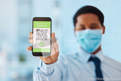 Image of QR code, scan and phone with online covid vaccine certificate by businessman showing mobile screen. App, hand and digital passport of an employee or tourist as new normal travel closeup