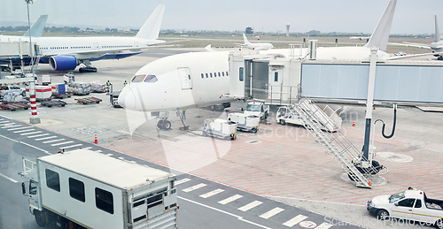 Image of Airport runway, travel and cargo for airplane for takeoff, international flight and commercial transportation. Air transport, global destination and plane loading baggage, luggage and boarding