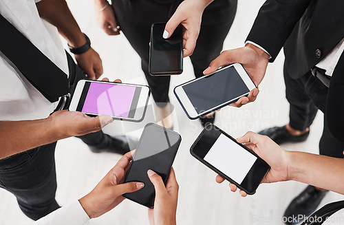 Image of Phone, hands and business people group networking, sharing and data exchange while standing in a circle. Smartphone, people and internet, search and web browsing for creative, planning and online app