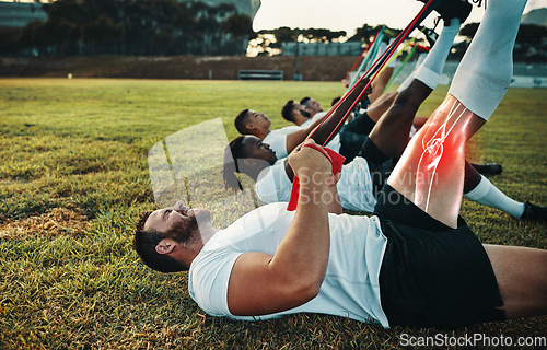 Image of Sports, rugby or team and a man stretching his leg to warm up with red overlay to highlight a bone or muscle injury. Fitness, exercise and resistance with a male athlete training for a sport workout