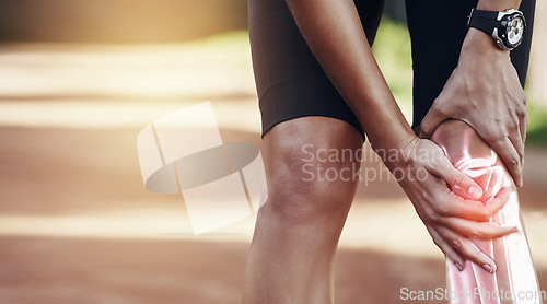 Image of Hands, knee and injury with a sports man holding his joint in pain after suffering an accident while running outdoor. Fitness, exercise or training and a male athlete struggling with an injured leg