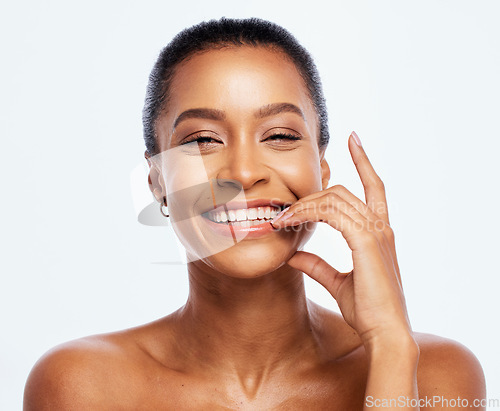 Image of Portrait, beauty and dental with a model black woman in studio isolated on a white background for oral hygiene. Face, skincare and teeth with an attractive young female posing on blank space