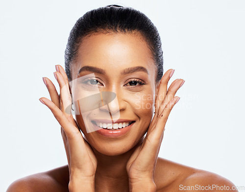 Image of Hands on face, skincare and beauty woman portrait in studio for dermatology, cosmetics and makeup. Aesthetic model happy with a luxury spa facial and natural skin glow isolated on a white background