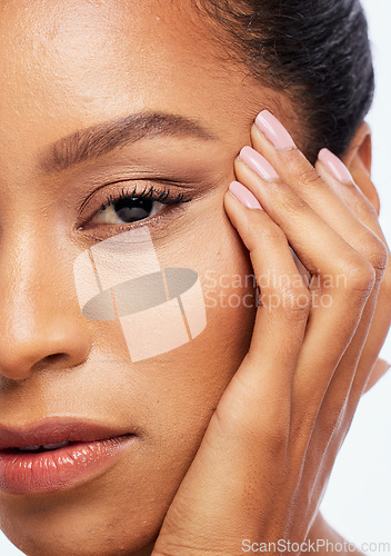 Image of Beauty, skincare and zoom face of black woman in studio for wellness, healthy skin and dermatology. Self care, spa aesthetic and portrait of girl with cosmetics, makeup products and facial treatment