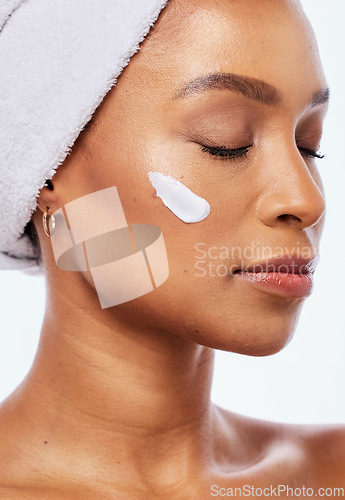 Image of Skin care, beauty cream and face of a woman in studio for dermatology, cosmetics and natural glow. Aesthetic model person with luxury spa facial and healthy shine isolated on a white background