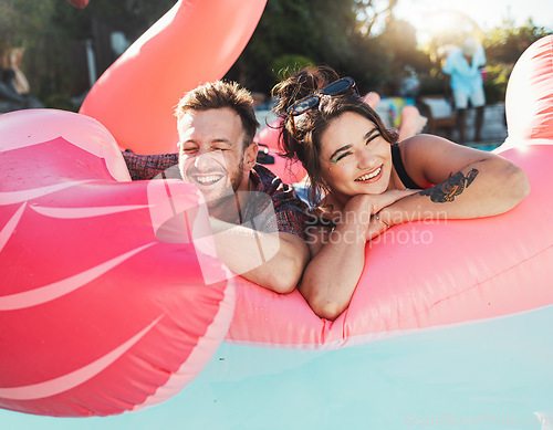 Image of Pool party, portrait and happy couple floating in the water together while on vacation at a resort. Float, summer and young man and woman in a swimming pool having fun on a holiday or weekend trip.