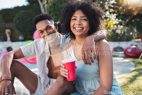 Image of Portrait, party and summer with a black couple having fun outdoor while drinking at a celebration event. Love, alcohol and birthday with a young man and woman outside together at a social gathering