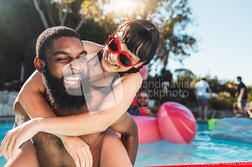 Image of Pool party, love and couple piggyback, having fun or bonding. Swimming, romance diversity and happy black man carrying woman in water and laughing at comic joke or meme at summer event or celebration
