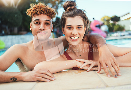 Image of Party, swimming and portrait with a couple of friends in the pool outdoor together during summer. Love, water and diversity with a young man and woman swimmer enjoying a birthday or celebration event