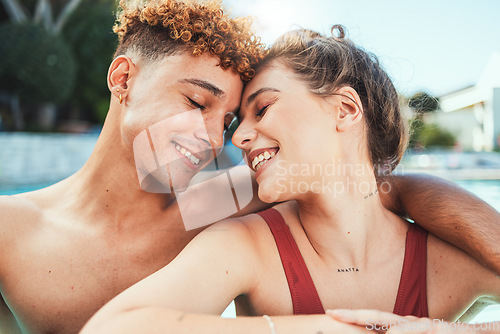 Image of Party, pool and diversity with a couple of friends swimming outdoor together during summer. Love, water and swim with a young man and woman swimmer enjoying a birthday or celebration event