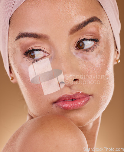 Image of Woman, muslim and studio closeup for beauty, makeup and wellness with radiant face by background. Islamic model, natural skin glow and hijab with cosmetic health, clean aesthetic or healthy skincare