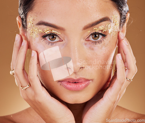 Image of Makeup, glitter and face portrait of woman with luxury gold eyeshadow, cosmetics product and facial skincare glow. Beauty, spa salon or aesthetic model girl with sparkle, shine or healthcare wellness