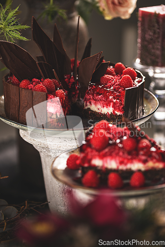 Image of Tasty chocolate cake with raspberries