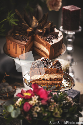 Image of Slice of layered chocolate mousse cake