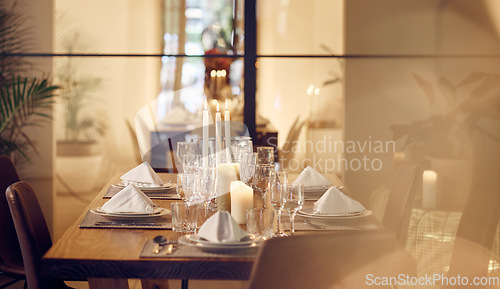 Image of Restaurant, fine dining or table in dinner celebration, birthday or new years party at luxury social event. Empty, nobody or decoration with champagne drinks or wine glasses at dinner gala on holiday