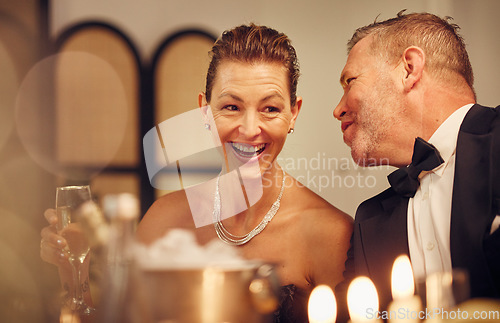 Image of Party, gossip or mature friends at a celebration, birthday dinner or new year luxury social event. Wine, senior man and happy woman bonding in fun conversation at a gala talking or speaking together