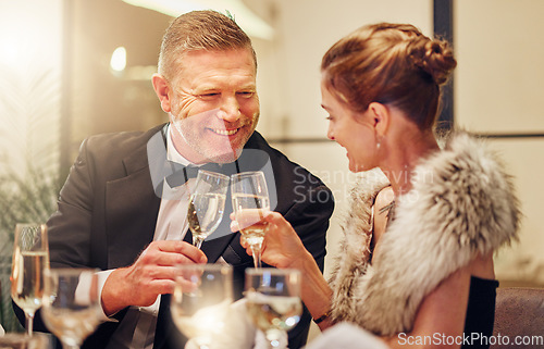 Image of Success, toast or couple in a party in celebration of goals, achievement or new year at luxury event. Motivation, smile or happy people cheers with champagne drinks or wine glasses at dinner gala