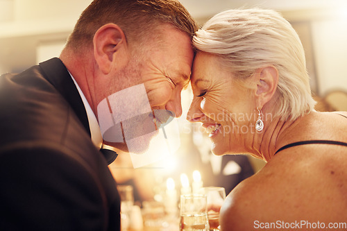 Image of Love, forehead or senior couple in a party in celebration of goals or new year at luxury social event. Romance, happy woman or romantic man smiles enjoy an embrace or bonding at dinner gala together