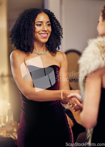 Image of Success, handshake or black woman in a party shaking hands in a partnership agreement at an event. Thank you, congratulations or happy lady greeting or social meeting at luxury dinner gala for a deal