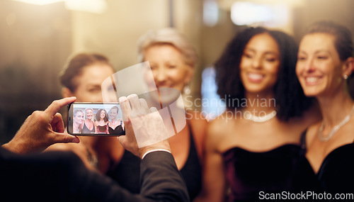 Image of Phone, photography or women in a party in celebration of goals or new year at fancy luxury event. Girlfriends, camera pov or happy people take pictures for social media at dinner gala or fun birthday