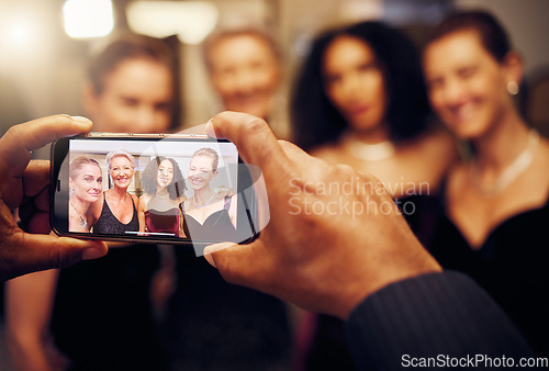 Image of Phone photography, hands or friends in a party to celebrate goals or new year at fancy luxury event. Women, screen or happy people smile in pictures for social media at dinner gala or fun birthday