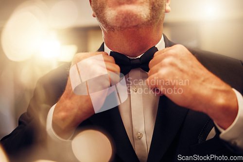 Image of Hands, fix bowtie and tuxedo for party, event or celebration gala in night for formal fashion. Senior man, evening clothes and designer suit by blurred background to ready for new years eve in mirror