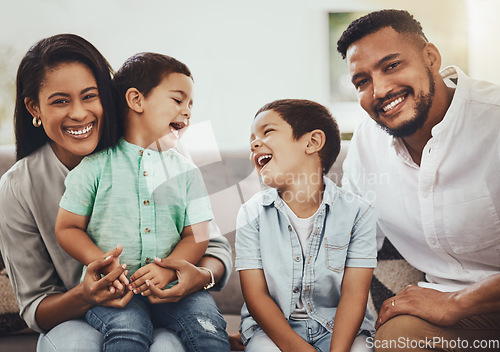 Image of Father, mother and smile with children of family spending holiday break or weekend together on living room sofa at home. Happy dad, mom and kids laughing in joy for fun bonding relationship indoors