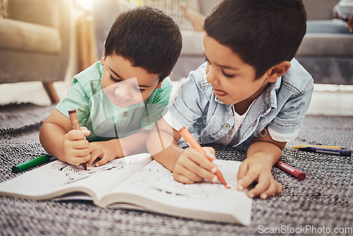 Image of Kids, brothers and drawing while learning on floor at home, relax and happy while bonding. Children, art and sketch in notebook by siblings having fun in living room, smile and enjoying brotherhood