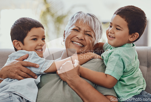 Image of Love, grandmother and boys on couch, smile and playful on weekend, bonding and loving together. Granny, grandkids and male grandchildren on sofa in lounge and happiness on summer vacation or carefree