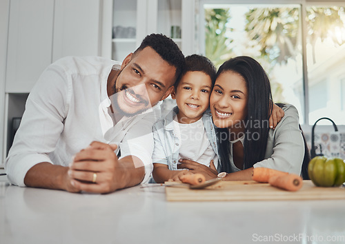 Image of Kitchen, portrait and parents with their boy child to cook dinner, supper or lunch together. Love, smile and happy family from Brazil preparing healthy food or meal with vegetables in their house.