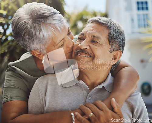 Image of Black senior couple, hug and kiss for love, retirement holiday and happiness outdoor together. African man, woman kissing and happy quality time or marriage relationship bonding on travel vacation