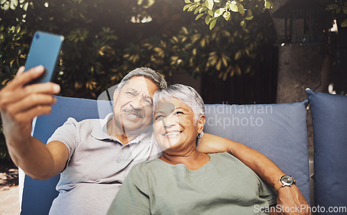 Image of Relax, smile and senior couple with a selfie on an outdoor couch during retirement holiday in Spain. Happy, communication and elderly man and woman with a photo for a memory, streaming and social app