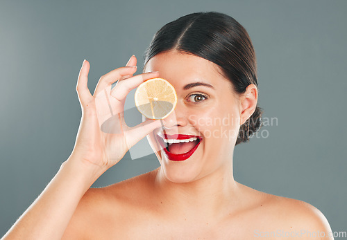 Image of Orange, skincare, woman or aesthetic wellness for healthy diet, happy results or clean glowing on grey background. Beauty portrait, smile or girl model face, facial makeup or cosmetics for health