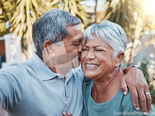 Image of Love, kiss and happy with selfie of old couple for retirement, smile and affectionate in garden of home. Bonding, happiness and summer with senior man and woman in for romantic, picture and peace