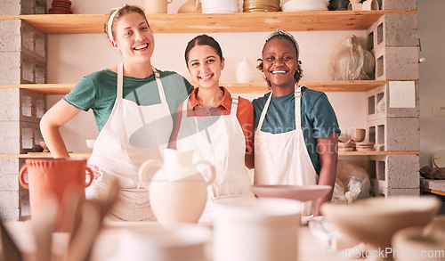 Image of Pottery class portrait, hug and women design sculpture mold, ceramic manufacturing or art product. Diversity, retail store and startup small business owner, artist or happy people in workshop studio