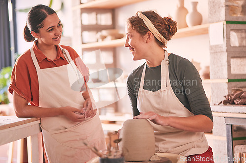 Image of Pottery studio, workshop and talking women doing sculpture design mold, manufacturing or art product. Creative, vase molding and startup small business owner, employee or friends in ceramic store