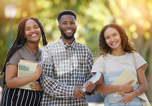 Image of University students, friends and group portrait at park outdoors ready to start learning business management. Scholarship books, education and happy people, man and women standing together at college