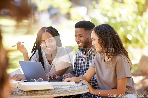 Image of Students, friends and group studying with laptop at park outdoors. Education scholarship, learning teamwork and happy people, black man and women with computer for research at university or college.