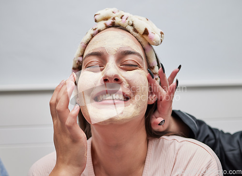 Image of Facial, spa and skincare by a woman with a face mask for beauty treatment as self care by beautician. Wellness, peeling and cosmetic salon for a happy female cleaning her skin for a smooth glow