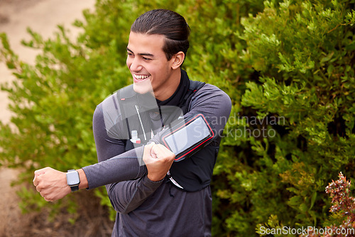 Image of Fitness, stretching and man in nature for training, workout or running with wellness, muscle health and 5g technology. Happy athlete doing warm up for outdoor, park or forest sports, hiking or cardio