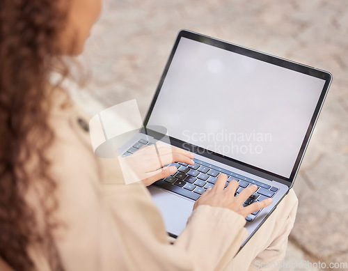 Image of Laptop, mockup and woman typing outdoor on social media, email and internet. Hands, person and screen space on computer keyboard, website and seo tech for research, online connection or remote worker