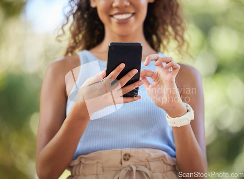 Image of Phone, social media and woman online texting on the internet, web or app outdoors in a park. Closeup, mobile and surfing on a website by a happy person connecting due digital communication