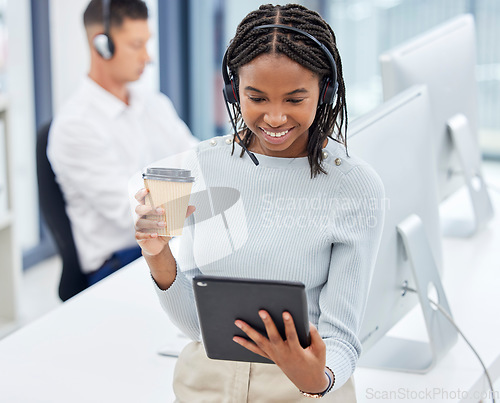Image of Call center agent, tablet and office for research, focus and analytics with smile, coffee cup and networking. Customer service, consultant and black woman in tech support, telemarketing and service