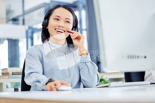 Image of Call center, customer service and woman at computer while consulting online for CRM, contact us or sales website. Asian person at help desk for telemarketing, support and communication with a smile