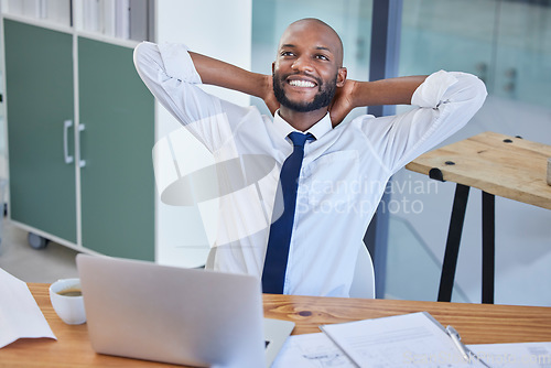 Image of Business laptop, black man and relax in office after finishing project or complete task. Break, thinking or male worker resting after hard work, writing email or planning finance strategy in company