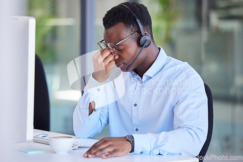 Image of Tired, headache and call center with businessman at computer for frustrated, stress and mental health. Telemarketing, customer support and contact us with employee with burnout, anxiety or overworked